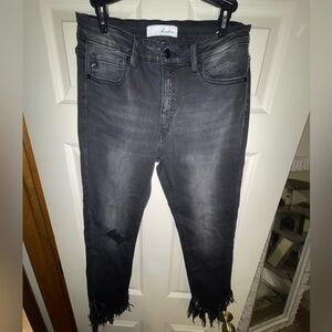 Black frayed skinny jeans